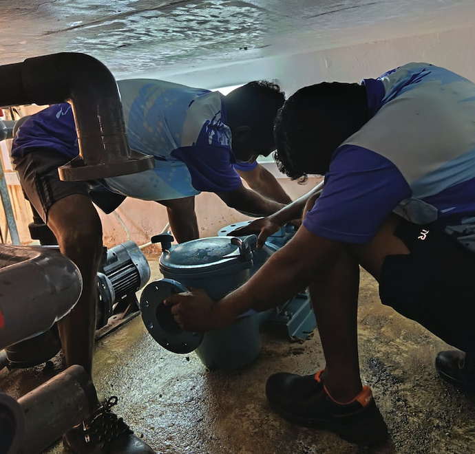 Hydrology technician maintaining a condominium plunge pool